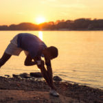 man-stretching-sunrise.jpg